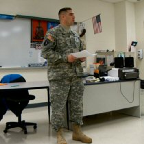 Picture of Soldier in front of classroom