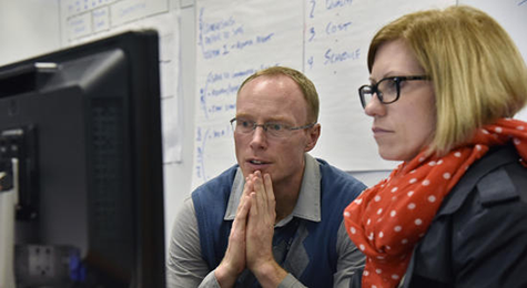 Eric Pear and Shaena Overstreet work on a simulation